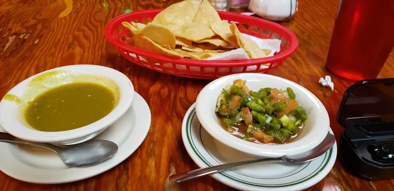 Chips with red and green salsa