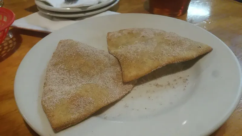 Sopaipillas dusted with cinnamon sugar